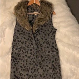 Lightly worn faux fur trimmed vest